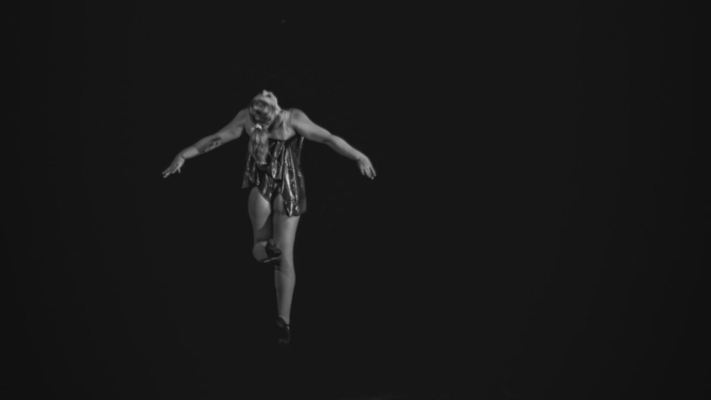 flying person over clouds